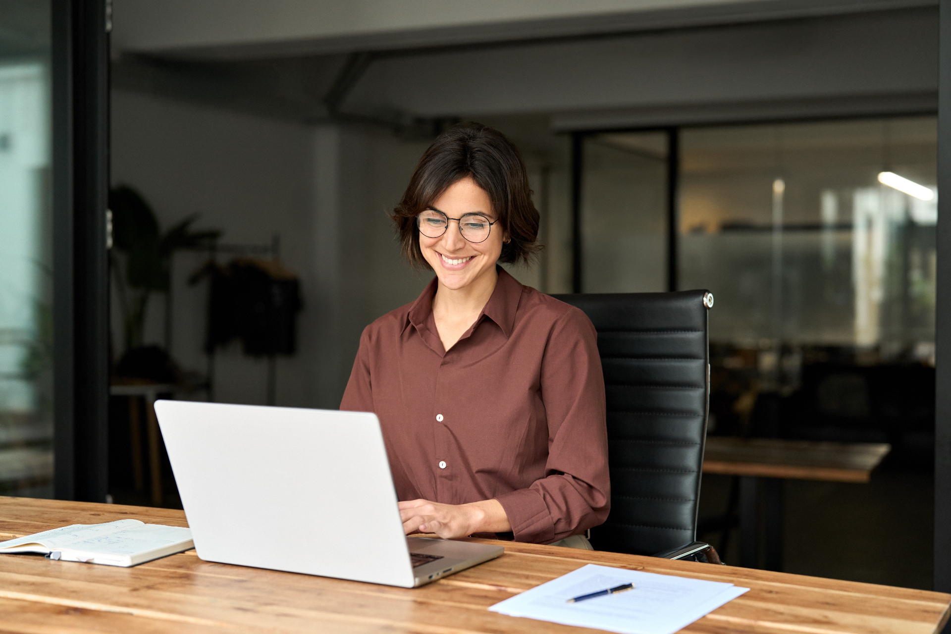 Consultant working at laptop